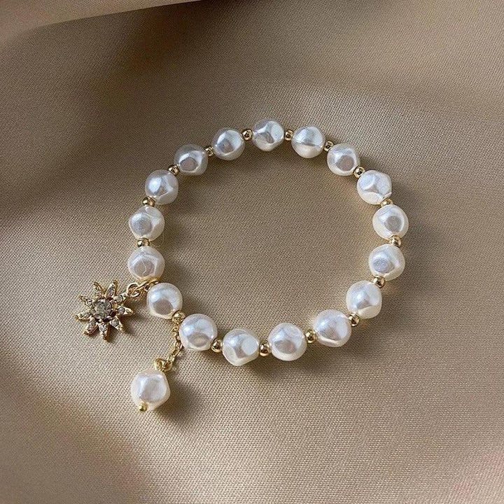 Bracelet with White Gold Medallion, Daisy and Sunflower