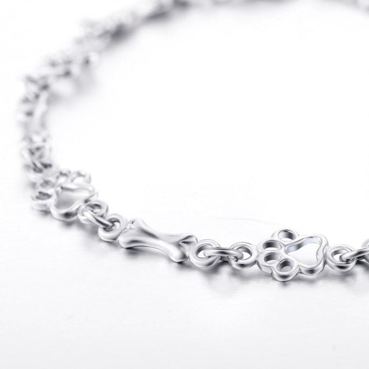 Bracelet with Hanging Dog Paws and Bones in White Gold, Limited Edition