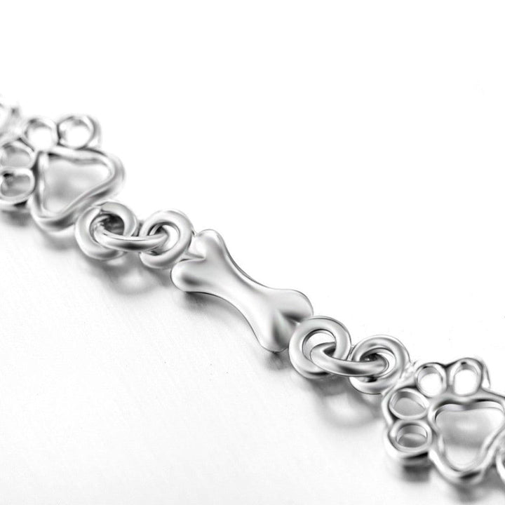 Bracelet with Hanging Dog Paws and Bones in White Gold, Limited Edition