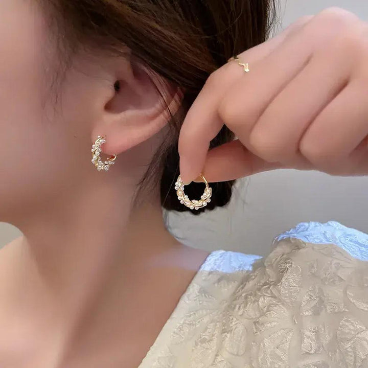 Elegant Earrings Made of Round Pearls