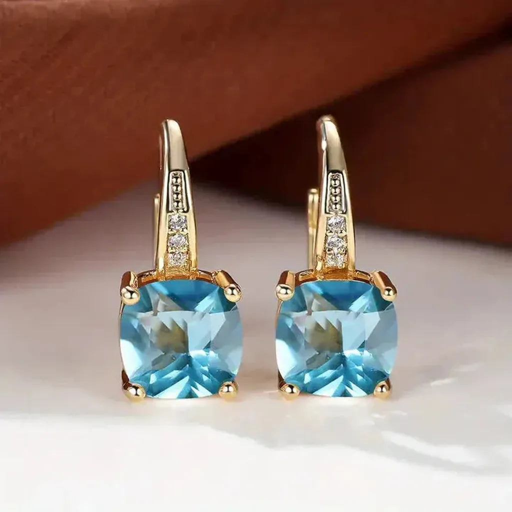 Golden Hoop Earrings with Mysterious Stones