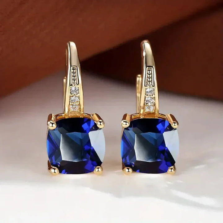 Golden Hoop Earrings with Mysterious Stones