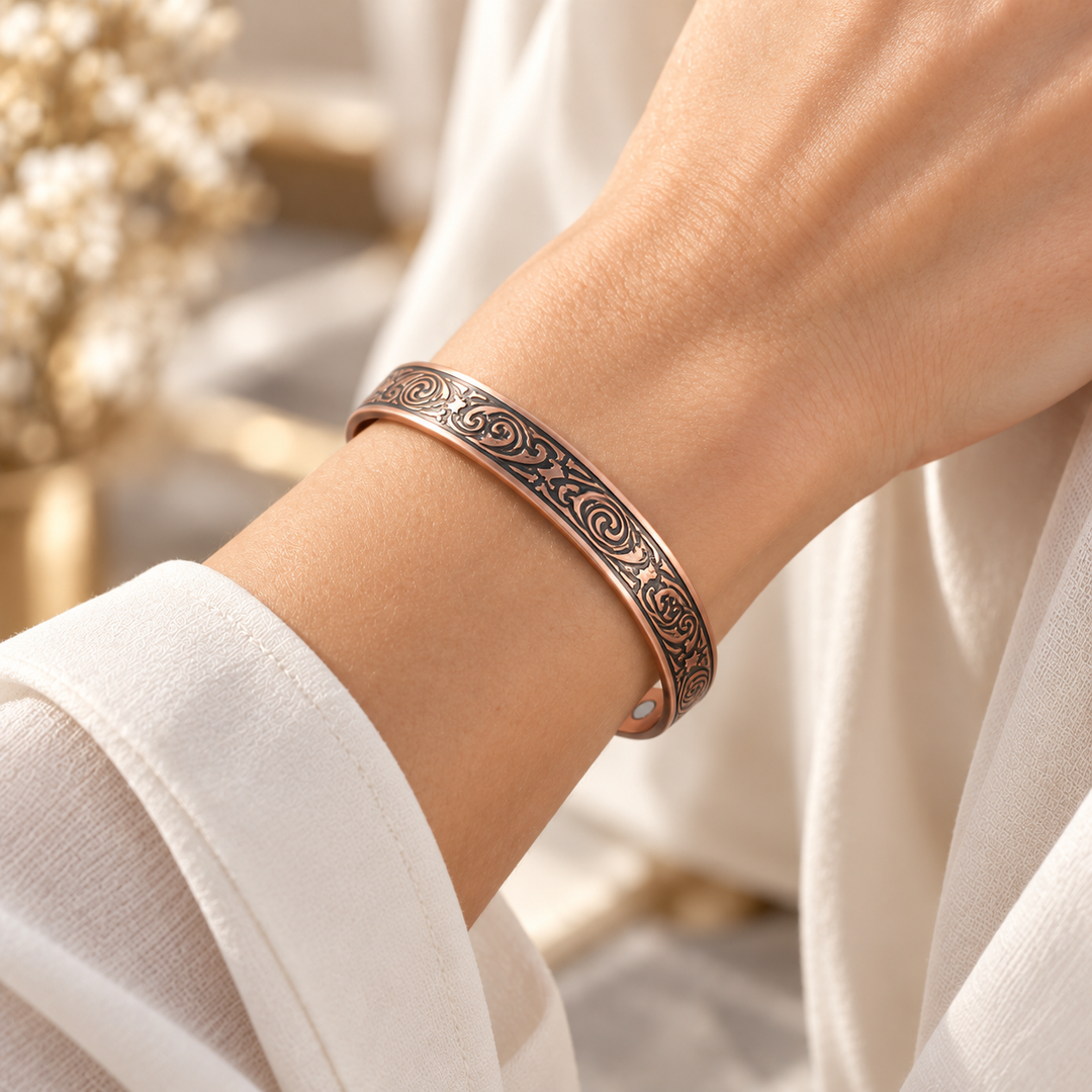 Copper bracelet with mystical swirls