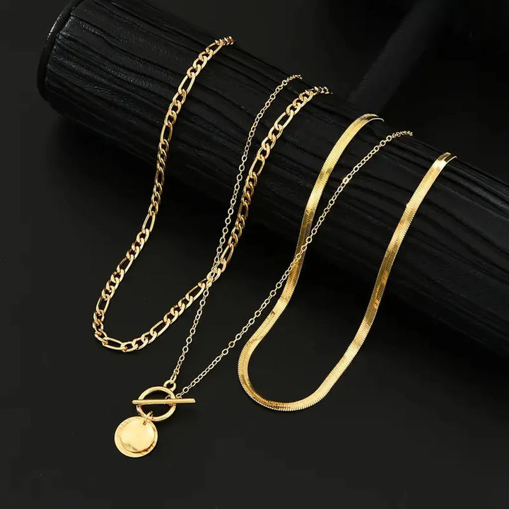 Multi-layered necklace with coins and texture