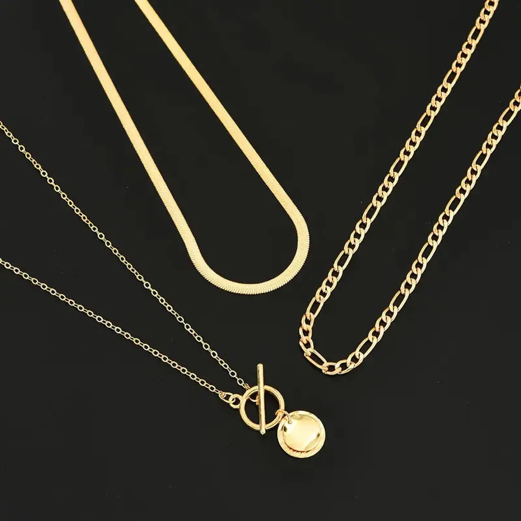 Multi-layered necklace with coins and texture