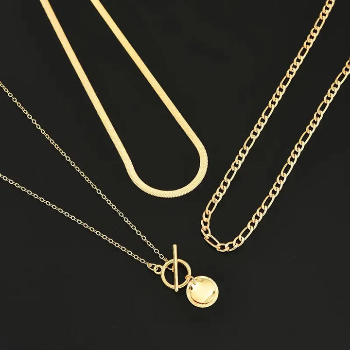 Multi-layered necklace with coins and texture