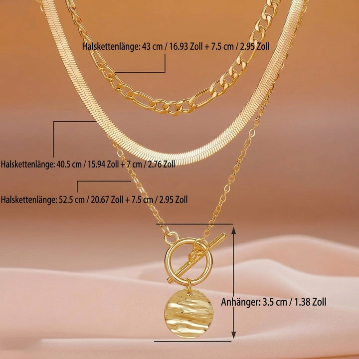 Multi-layered necklace with coins and texture