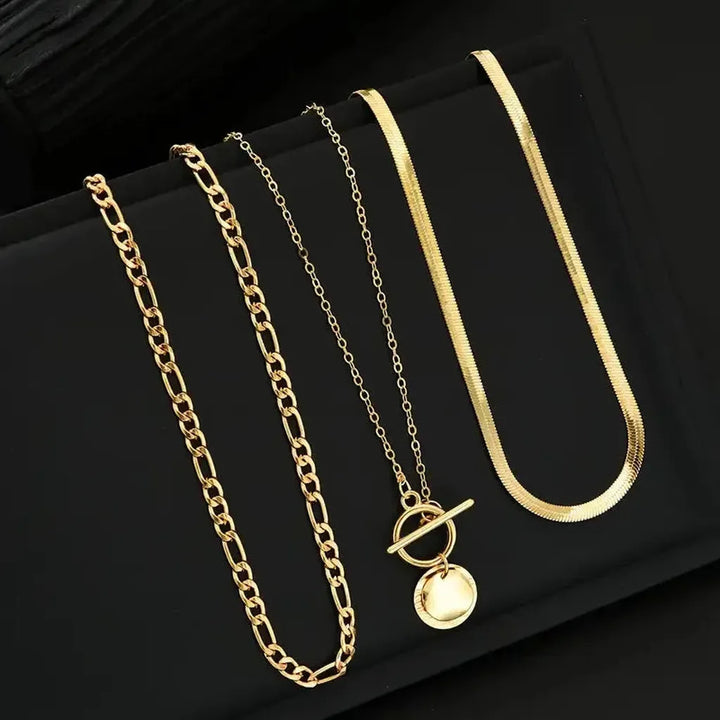 Multi-layered necklace with coins and texture