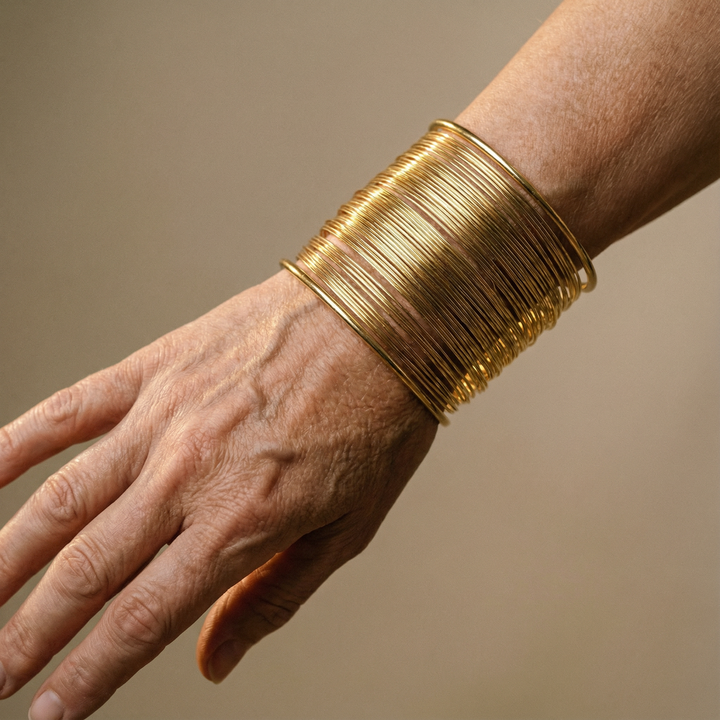 Open Bracelet with Spiral in Gold