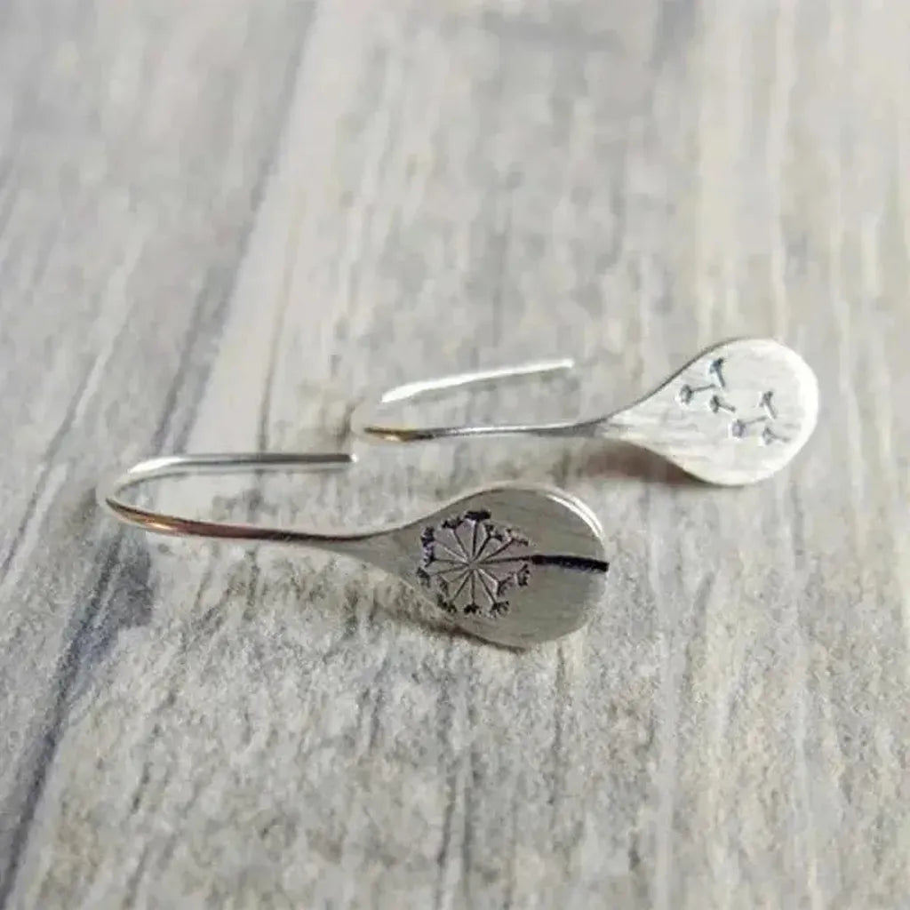 Earrings made of lace in white gold