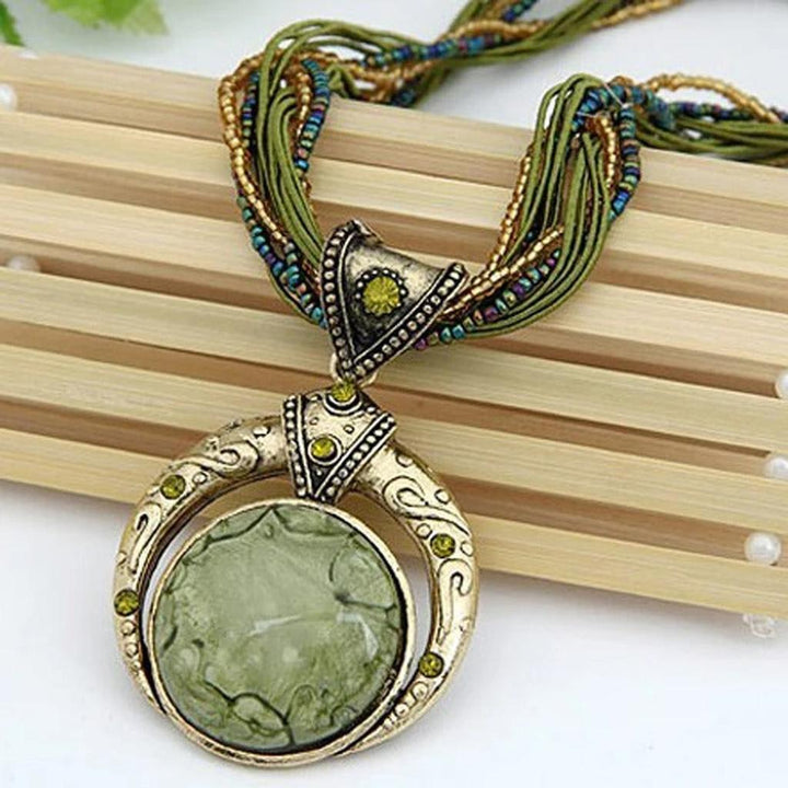 Retro Necklace with Ethno Pendant in Green Crystal