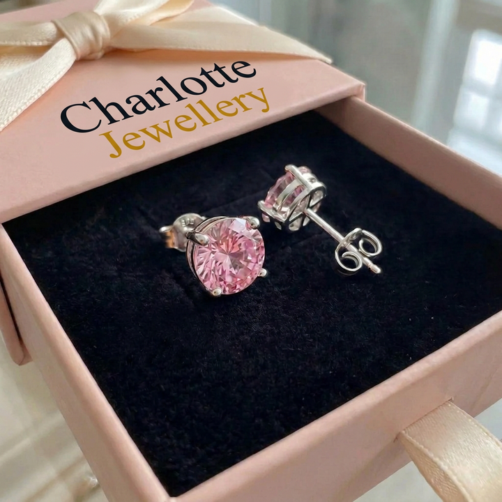 Round earrings made of pink sapphire | White gold